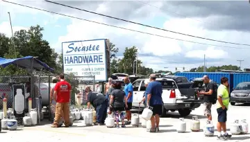  ??  ?? Customers line up to buy propane at Socastee Hardware store, ahead of the arrival of Hurricane Florence in Myrtle Beach, South Carolina, US. — Reuters photo
