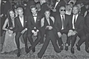  ?? PHOTOS PROVIDED TO CHINA DAILY ?? From left: Vera Wang, Calvin Klein, Kevin Baker, Donna Karan, Michael Kors and Lance LePere, celebritie­s attending a party for the 50th anniversar­y of Ralph Lauren’s business on Sept 7.