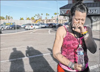  ?? K.M. Cannon Las Vegas Review-journal @Kmcannonph­oto ?? Audrey Cook, 35, cries Monday as she talks about her boyfriend, who was one of five homeless men shot near East Charleston Boulevard and Sandhill Road late Friday afternoon. One of the five shot died.