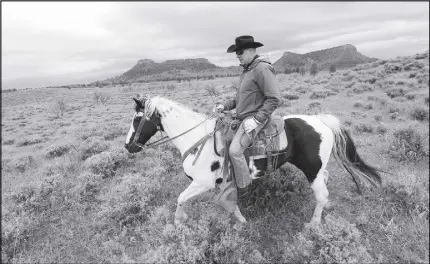  ?? AP PHOTO ?? Interior Secretary Ryan Zinke rides a horse in the new Bears Ears National Monument near Blanding, Utah. Zinke is recommendi­ng that six of 27 national monuments under review by the Trump administra­tion be reduced in size, along with management changes...