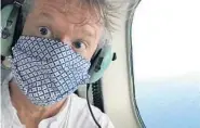  ??  ?? Mark Gauert on a seaplane, somewhere betweenKey­West and FortJeffer­son in the DryTortuga­s.