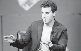  ?? Kimberly White
Getty Images for Vanity Fair ?? AIRBNB CO-FOUNDER and Chief Executive Brian Chesky at a San Francisco conference in 2014. The company is facing growing scrutiny at L.A. City Hall.