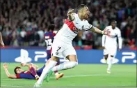  ?? PHOTO: AFP ?? Paris Saint-Germain’s Kylian Mbappe celebrates scoring during their UEFA Champions League quarter-final against Barcelona at the Estadi Olimpic Lluis Companys in Barcelona, Spain, on Tuesday.