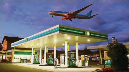  ??  ?? Higher price: An aircraft of Korean Airlines is seen above a BP petrol station approachin­g to land at Zurich Airport in Kloten, Switzerlan­d. Brent crude was up 69 US cents, or 1.1%, at US$64.03 a barrel by 0743 GMT. — Reuters