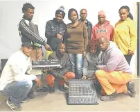  ??  ?? CRIME BUSTERS: Isolomzi Neighbourh­ood Watch members with the recovered sound system equipment, back from left, Zukile Ngxabazi, Xolile Balangile, Ayanda Mgxali, Olwetu Peter, Olwetu Ndatyana and Mpho Tose. Front from left, Anele Nontombana, Bongani...