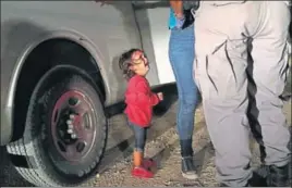  ?? AFP ?? ■ American dream, her nightmare: This image of a twoyearold Honduran asylumseek­er wailing as her mother is searched and detained by border patrol agents along the USMexico border has gone viral.