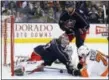  ?? JAY LAPRETE — THE ASSOCIATED PRESS ?? Columbus Blue Jackets’ Sergei Bobrovsky, left, tries to cover the puck as teammate Seth Jones, center, and Philadelph­ia Flyers’ Chris VandeVelde look for the rebound Saturday.