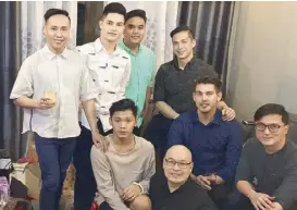  ??  ?? Harry with his family in Manila that includes his Dada Arsi Baltazar (foreground), Nat Manilag, Miggy Leyva, Francis Libiran, Christian Mark Jacobs, Dr. Gerry Buenaventu­ra and Gabriel Leyva. Not in photo are Tommy Castellani and Miguel Leyva.