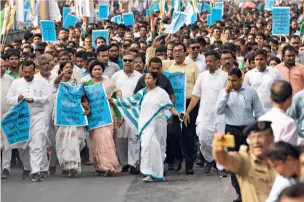  ??  ?? GAME ON CM Mamata Banerjee leads an anti-NRC padayatra in Kolkata