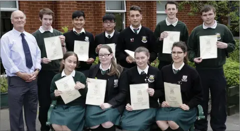  ??  ?? Year head Paul Connolly with students from the 6D class who won subject prizes: (back, from left) John Kelly, Ronello Nuqui, Brady Yeoh, Natan Bas, Jordan Kelly, Gary Shortt, (front) Iulia Radu, Tia Kenna, Yasmon Keogh and Patrycja Struzynska.