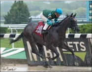  ?? CHELSEA DURAND/NYRA ?? Abyssinian, owned by Hat Creek Racing, ridden by Joel Rosario and trained by Wesley Ward raced to a maiden special weight victory in sloppy conditions May 19, 2018 at Belmont Park.