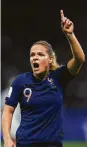  ?? Michael Regan / Getty Images ?? Eugenie Le Sommer converted a penalty kick to give France the win.