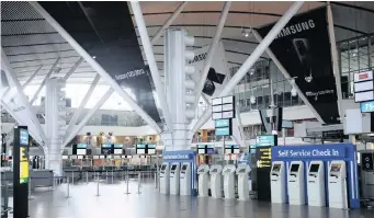  ?? COURTNEY AFRICA ?? AIRPORTS Company SA has put in place extensive physical measures, including self-service check-in kiosks, to minimise unnecessar­y contact, as well as staff training to give effect to the level 3 regulation­s. | African News Agency (ANA)