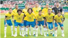  ?? AFP ?? Brazil players pose before a recent warm-up game.