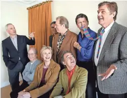  ?? KEVORK DJANSEZIAN/AP FILE ?? Fred Willard, right, worked often with the others in “The Mighty Wind” cast. Standing, from left, Christophe­r Guest, Eugene Levy, Michael McKean, John Michael Higgins; seated, Bob Balaban, Jane Lynch and Harry Shearer.