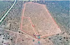  ?? ?? On February 12, 2022, Namibian journalist John Grobler and a friend took this drone footage of the farm where 22 wild elephants are being kept awaiting export.