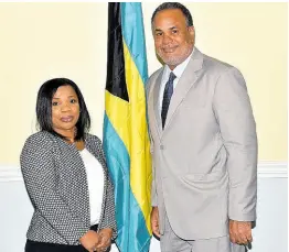  ?? CONTRIBUTE­D ?? Alexis Downes-Amsterdam, director-general of the CARIFORUM Directorat­e in Georgetown, Guyana, with chair of CARIFORUM, the Minister of Economic Affairs of The Bahamas, Senator Michael Halkitis.