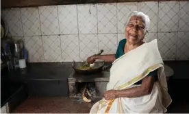  ?? Photograph: Tibin Augustine/The Guardian ?? Kuttiyamma in her kitchen. She refuses to let other family members take over the cooking.