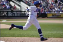  ?? ASSOCIATED PRESS FILE PHOTO ?? New York Mets’ Curtis Granderson, wearing his custom socks, looks great trotting the bases after hitting a home run.