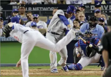  ?? JAE C. HONG — THE ASSOCIATED PRESS ?? Chicago Cubs’ Anthony Rizzo hits a two-run scoring single during the sixth inning of Game 4 of the National League Championsh­ip Series against the Los Angeles Dodgers on Wednesday.