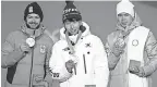  ?? GEOFF BURKE/USA TODAY SPORTS ?? From left, silver medalist Sjinkie Knegt of the Netherland­s, gold medalist Lim Hyo-jun of South Korea and bronze winner Semen Elistratov of the Olympic Athletes from Russia.