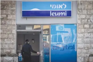  ?? (Chaim Goldberg/Flash90) ?? A BANK LEUMI in Jerusalem. The settler sanctions affair is closely related to another prize for terrorism – the ‘two-state solution.’