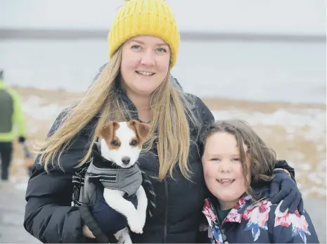  ??  ?? Laura Bell and daughter Eva, seven, with Ted.