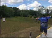  ??  ?? Toxophilit­e William Telfer, of Painesvill­e, takes aim at Hidden Lake’s new archery range in Leroy Township earlier this year.Chad Felton — The NewsHerald