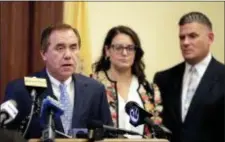  ?? ASSOCIATED PRESS FILE PHOTO ?? New Jersey Assembly Speaker Craig Coughlin D-Woodbridge, N.J., left, speaks during a news conference near Assemblywo­man Eliana Pintor Marin, D-Newark, N.J., center, and Assemblyma­n Louis Greenwald, D-Voorhees.