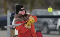  ?? ?? It may not have been exactly spring-training weather, though the snow wasn’t plentiful, but batters were in action Saturday at the annual Snofest in Linwood.