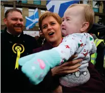  ??  ?? Nicola Sturgeon and SNP candidate Owen Thomson in Dalkeith