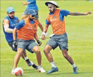  ?? REUTERS ?? India captain Virat Kohli (left), Ajinkya Rahane and KL Rahul play football at their training session ahead of the limitedove­rs series against Sri Lanka, in Dambulla on Friday.