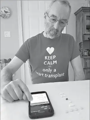  ?? Courtesy Mike Willis ?? Mike Willis takes 27 pills a day, most of them anti-rejection drugs to ensure that his body doesn’t reject the heart transplant he received 2 1/2 years ago. He uses an app called Medisafe to help him keep track of when it’s time for his next dose.