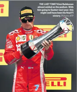  ?? Picture: AFP ?? THE LAST TIME? Kimi Raikkonen almost smiled on the podium. With him going to Sauber next year, this might well have been his final F1 victory.