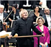  ??  ?? Rattle effect: the conductor’s authority and adventurou­sness endears him to audiences
