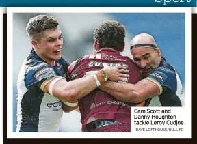  ?? DAVE LOFTHOUSE/HULL FC ?? Cam Scott and Danny Houghton tackle Leroy Cudjoe