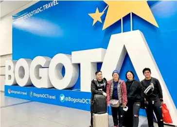  ?? PHOTOGRAPH COURTESY OF JEANETH ARO/FB ?? HIDILYN Diaz (second from left) arrives in Bogota to compete in the 2022 IWF World Weightlift­ing Championsh­ips.