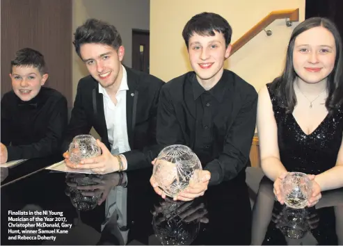  ??  ?? Finalists in the NI Young Musician of the Year 2017, Christophe­r McDonald, Gary Hunt, winner Samuel Kane and Rebecca Doherty