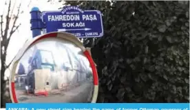  ??  ?? ANKARA: A new street sign bearing the name of former Ottoman governor of Madinah Fahreddin Pasha marks the street that leads to the UAE embassy building yesterday. — AFP