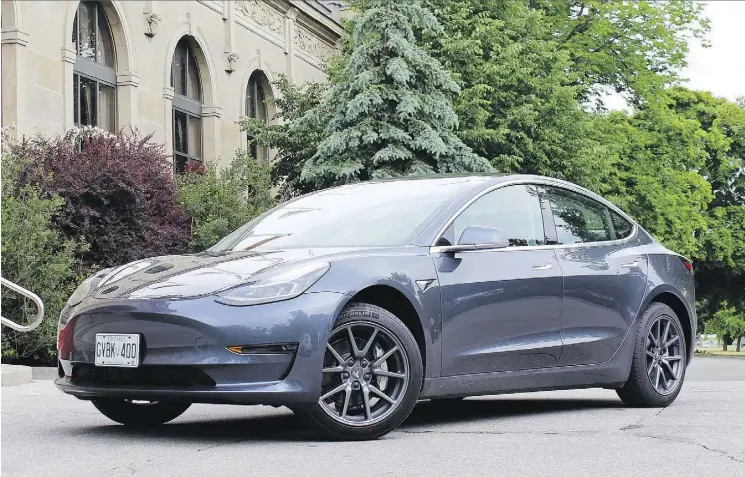  ?? PHOTOS: PETER BLEAKNEY/DRIVING ?? The long-awaited Tesla Model 3 offers sharp handling and with the long-range battery is expected to travel almost 500 kilometres on a charge.