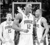  ?? STAFF FILE PHOTO ?? Orlando fans hope new coach Steve Clifford can lead the Magic back to the heights the team reached in 2009, when Dwight Howard, center, Hedo Turkoglu, left, and Rashard Lewis were key in the team’s run to the NBA Finals..