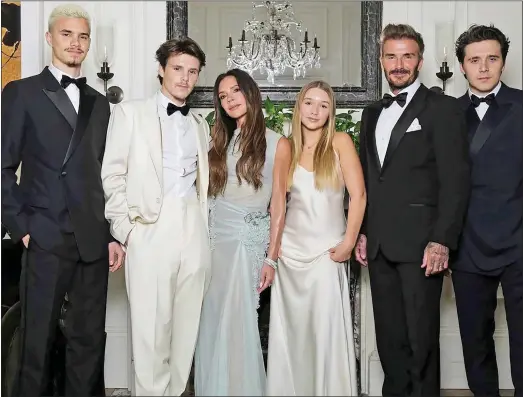  ?? ?? FAMILY AFFAIR: Romeo, left, Cruz, Victoria, Harper, David and Brooklyn pose at the Beckhams’ mansion before last night’s party