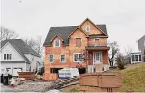  ?? Alexander Soule/Hearst Connecticu­t Media ?? A new home under constructi­on this month on Walnut Ridge Lane in Stamford. The city led Connecticu­t for home sales in the first two months of 2023, but sales were off nearly 40 percent from a year earlier amid record low new listings.