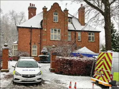  ??  ?? CRIME SCENE: Police vehicles parked outside Mr Perks’s £800,000 home in Nottingham­shire yesterday