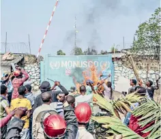  ?? ?? Protesters storm a United Nations base in the Congolese city of Goma