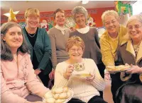  ??  ?? ●●Mince pies and coffee at Smithy Bridge Library