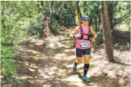  ??  ?? Amanda Osberg runs the North Face Endurance Challenge 50K in Costa Rica in May.