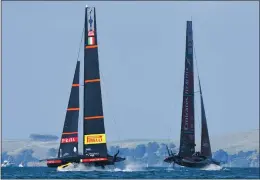  ?? CHRIS CAMERON — THE ASSOCIATED PRESS ?? Team New Zealand, right, races Italy’s Luna Rossa on Wednesday in race 10. Team New Zealand defeated Luna Rossa 7-3 to retain the America’s Cup.