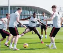  ??  ?? Manchester United players attend a training session ahead of their Premier Leugue match against Tottenham Hotspur.