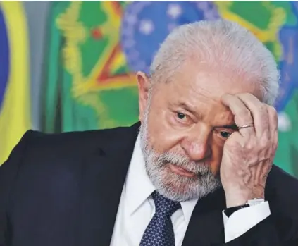  ?? ?? ►
Lula durante una reunión con líderes de la industria automotriz en Brasilia, en mayo de 2023.